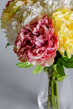 Celebrating with Artificial Congratulations Flowers 2 An arrangement of faux mixed peonies.