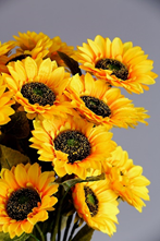 Celebrating with Artificial Congratulations Flowers 4 An arrangement of artificial sunflowers.
